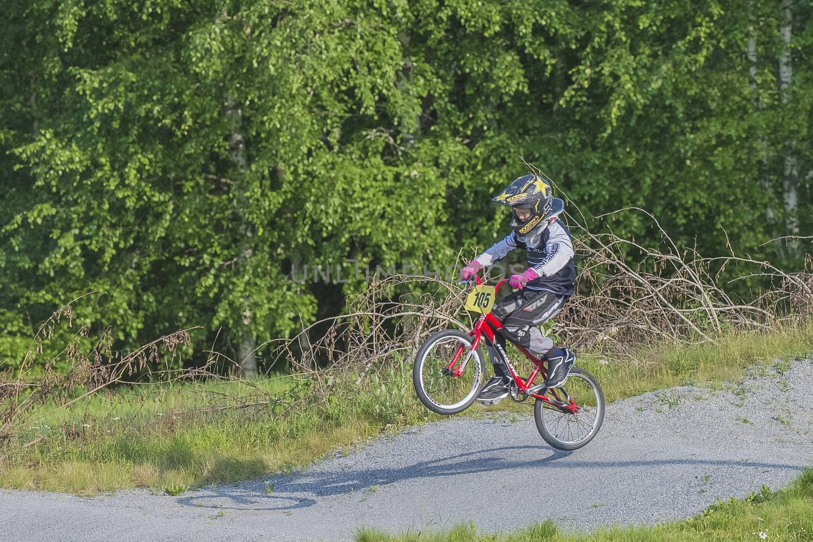 My grandson is an active BMX cyclist, the pictures are shot in Aremark Municipality, Norway where the Bmx track is.