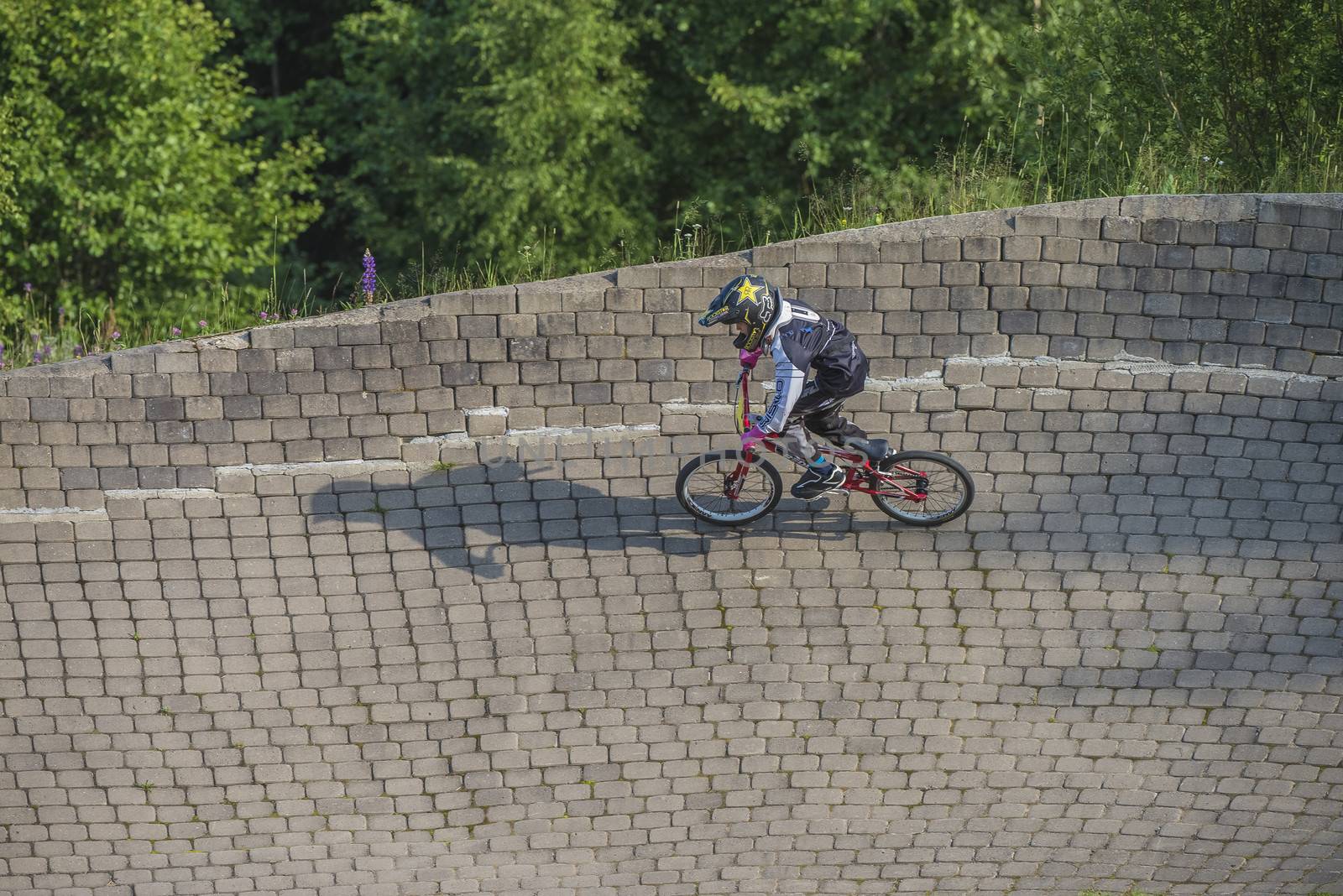 My grandson is an active BMX cyclist, the pictures are shot in Aremark Municipality, Norway where the Bmx track is.