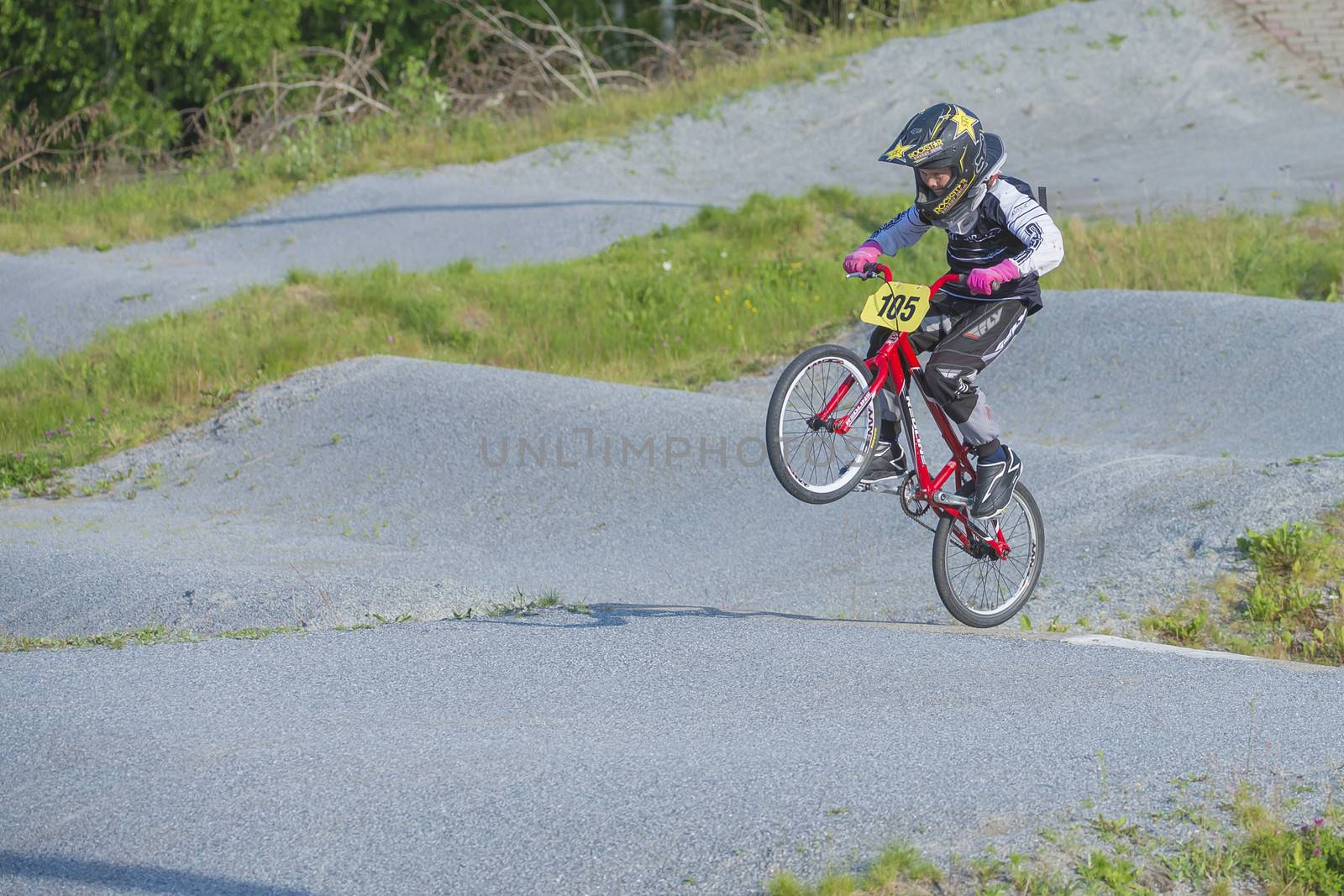 My grandson is an active BMX cyclist, the pictures are shot in Aremark Municipality, Norway where the Bmx track is.