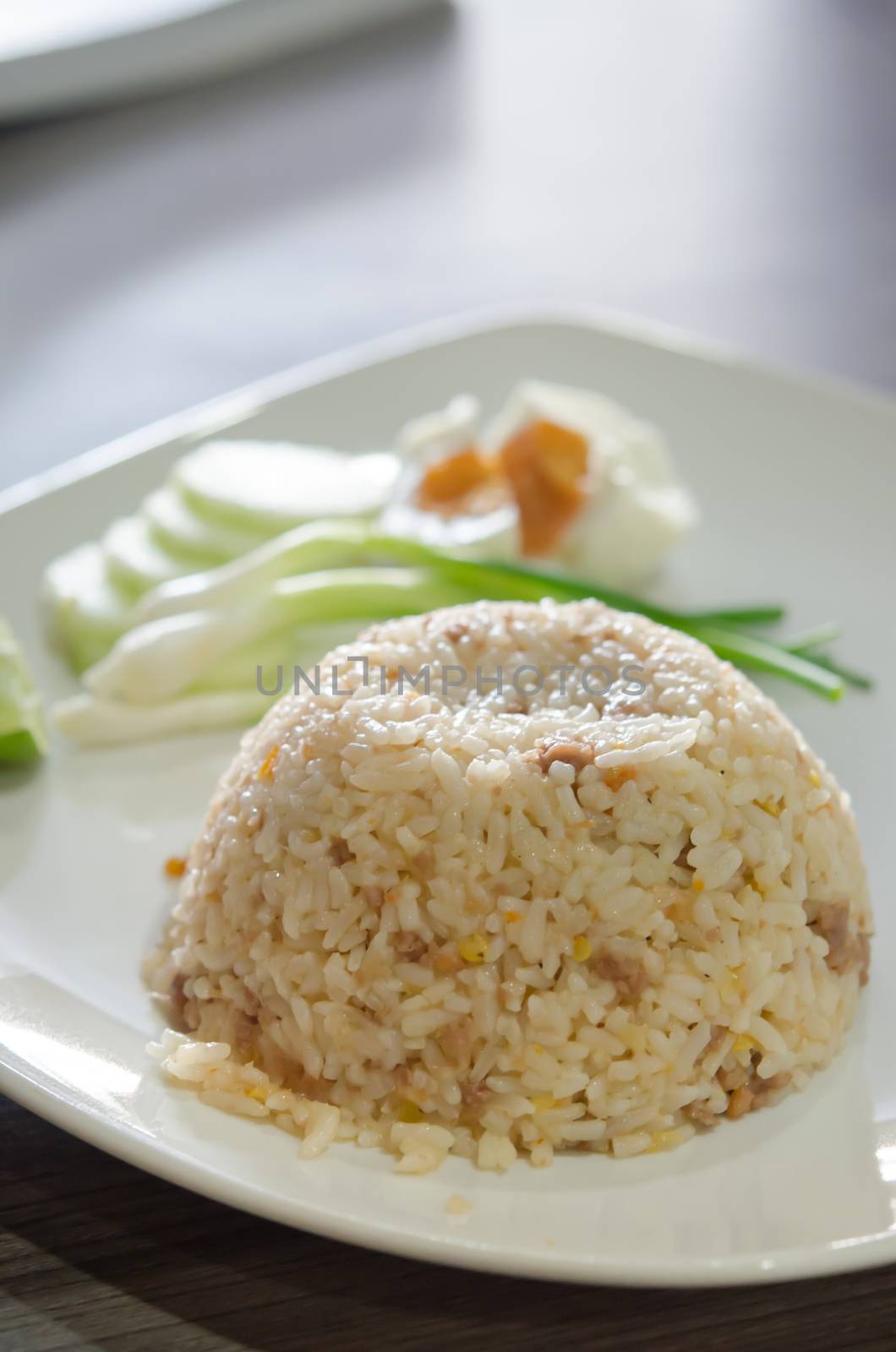 close up fried rice with pork  served with fresh vegetable