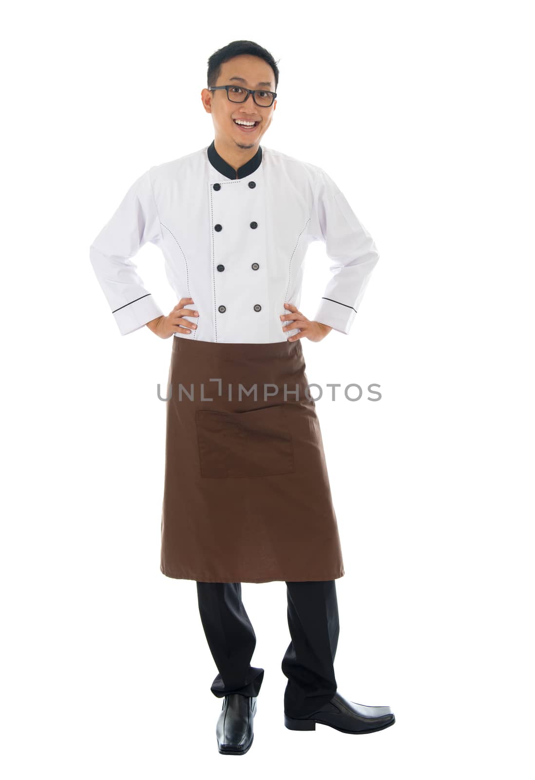 Portrait of full body Asian male chef, standing isolated on white background