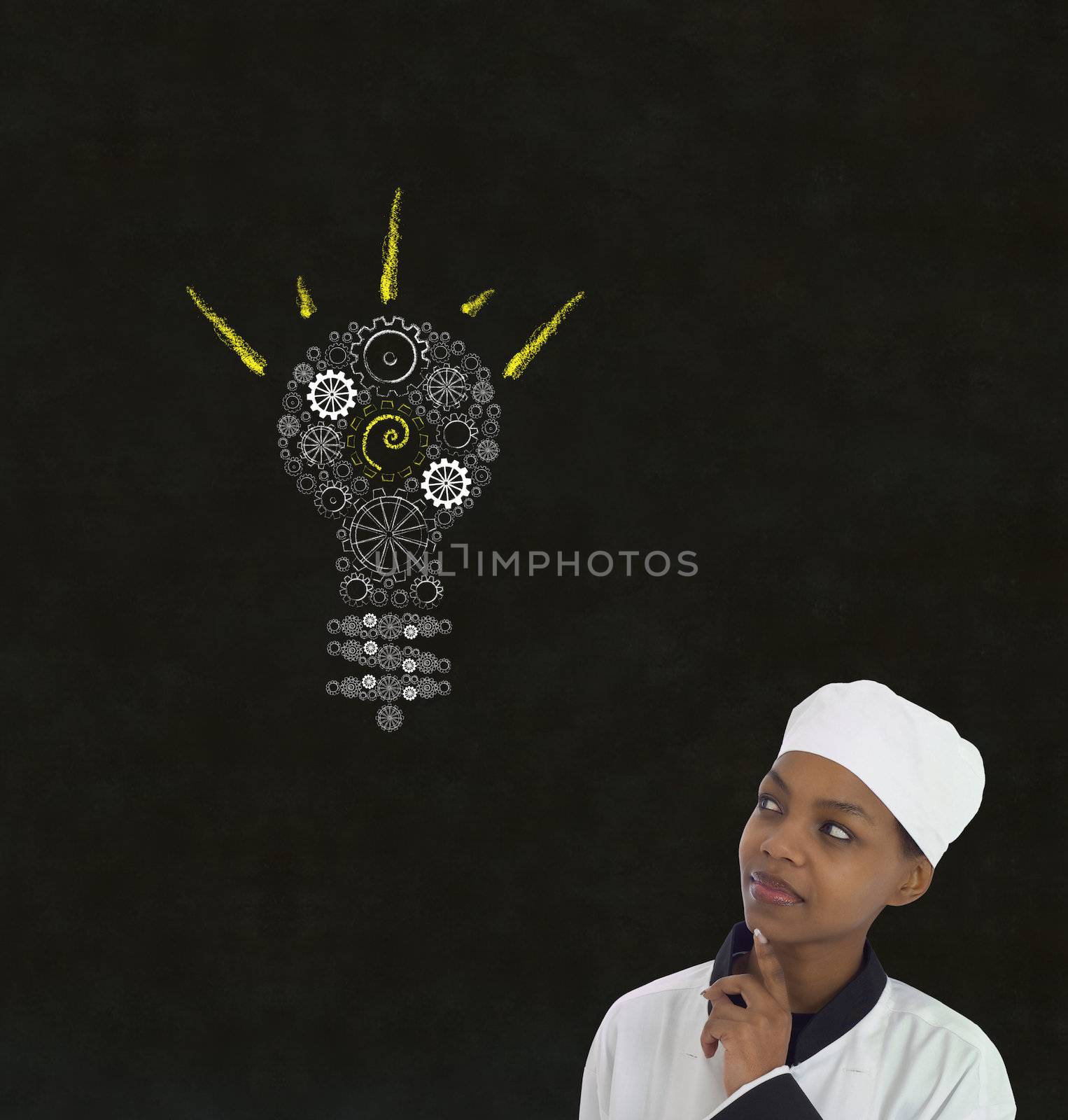 Gear cog lightbulb idea African woman chef on chalk blackboard background by alistaircotton