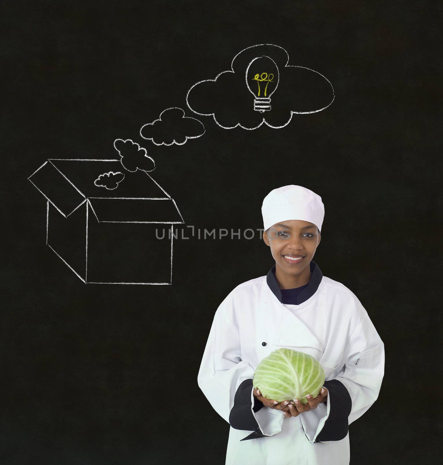 African woman chef thinking out the box chalk concept blackboard background by alistaircotton