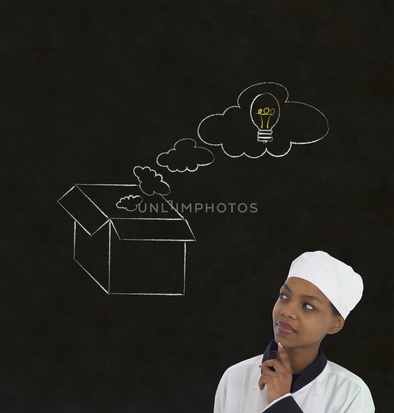 African woman chef thinking out the box chalk concept blackboard background by alistaircotton