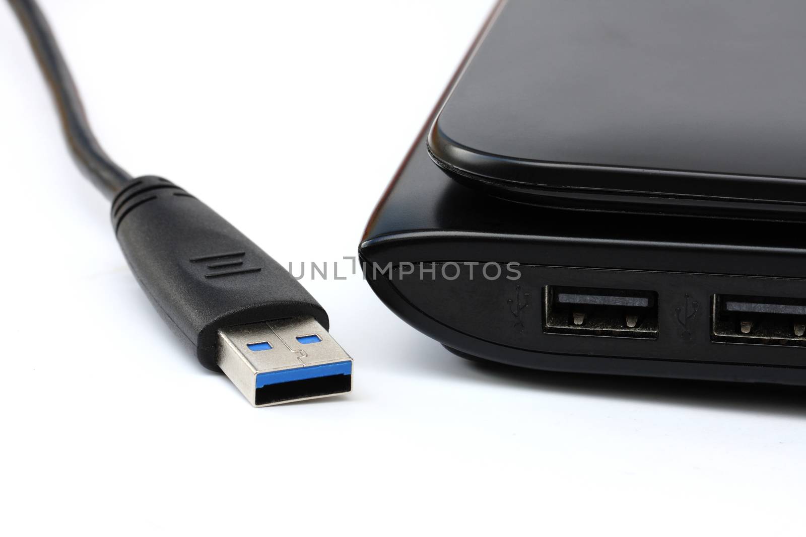 USB cable isolated and port USB notebook on white background