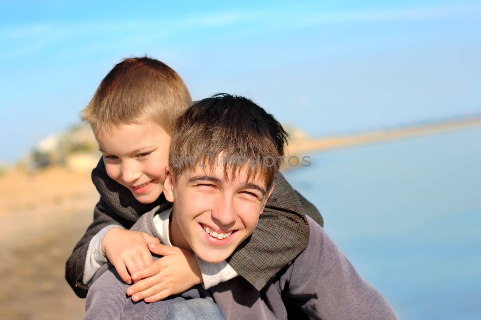 happy brothers outdoor by sabphoto