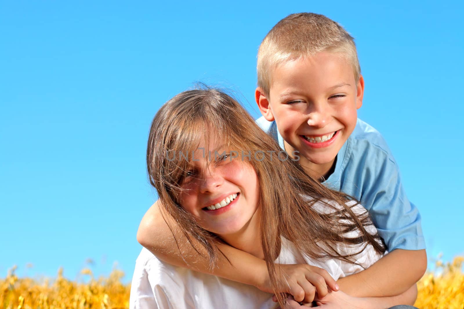 brother and sister in the wheat field