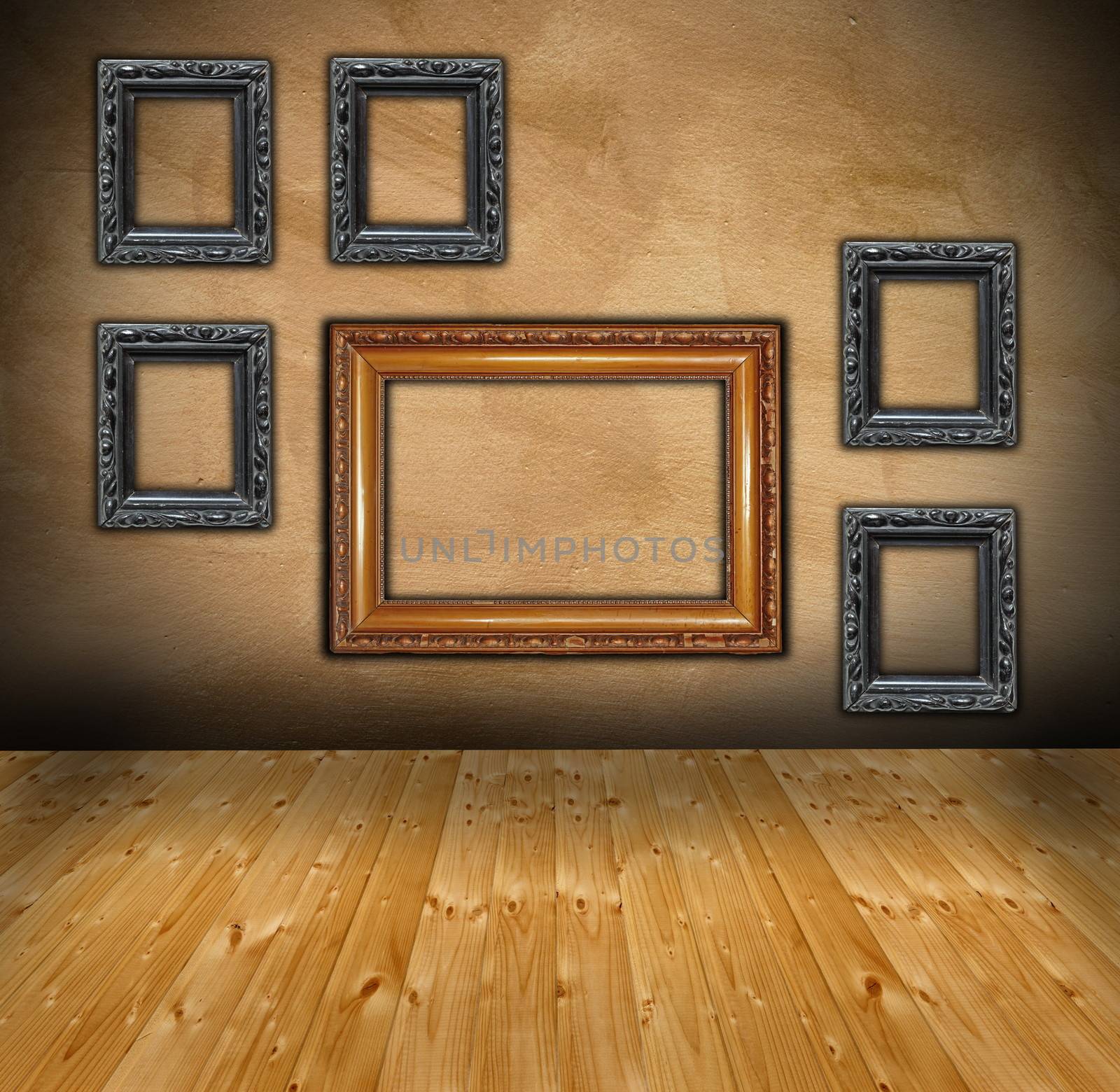 interior with wooden floor and wall with frames in an abstract composition ready for your design
