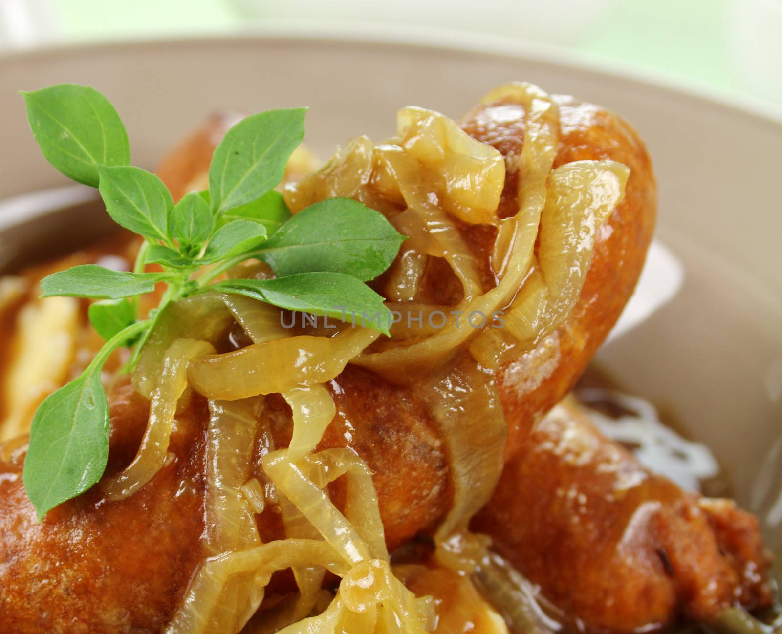 Delicious beef sausage with onion and Greek basil.