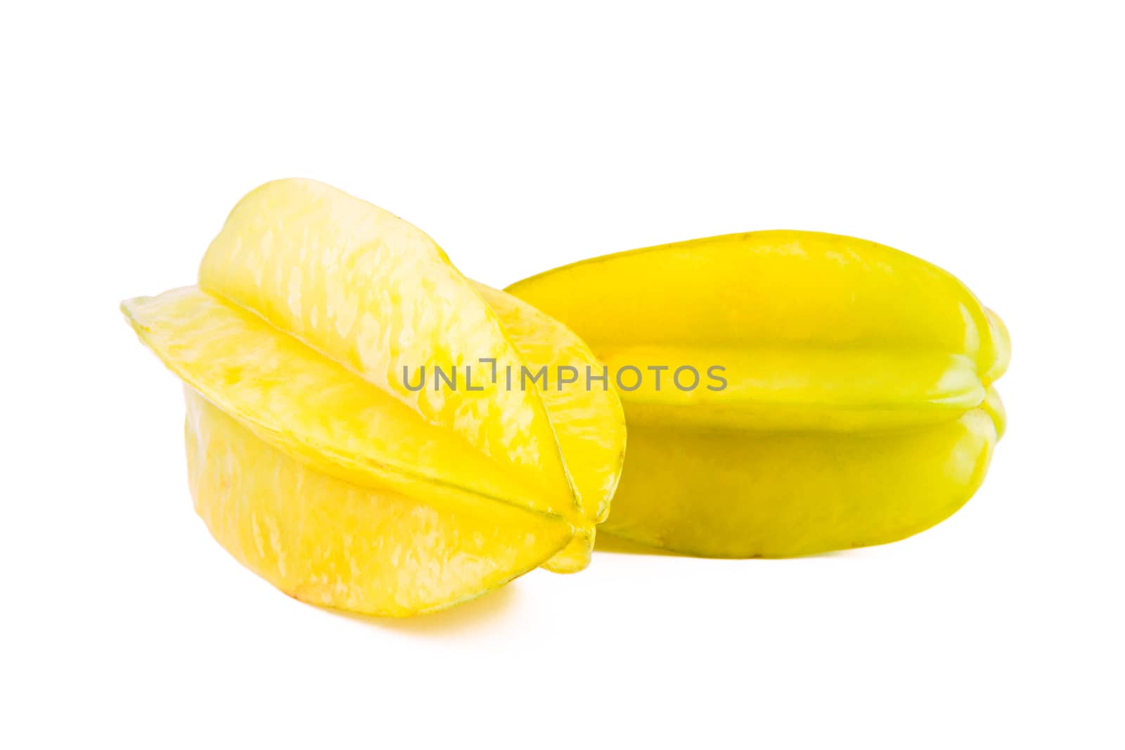 Fresh juicy carambola fruit isolated on white background