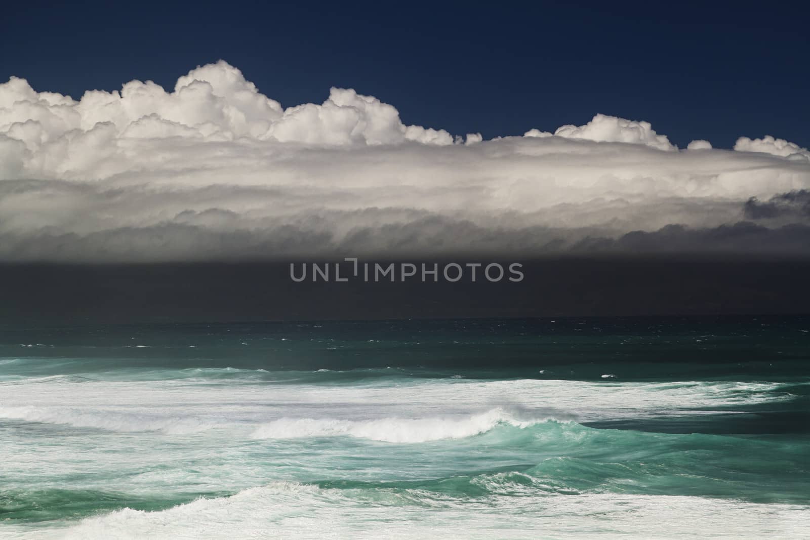 Storm cloud over the Pacific ocean in Maui