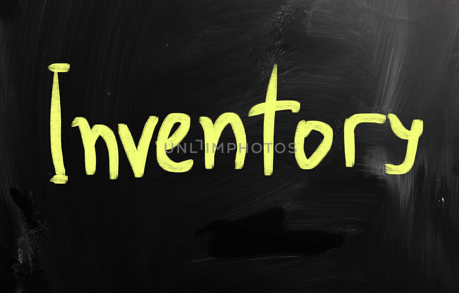 Business ideas handwritten with white chalk on a blackboard.