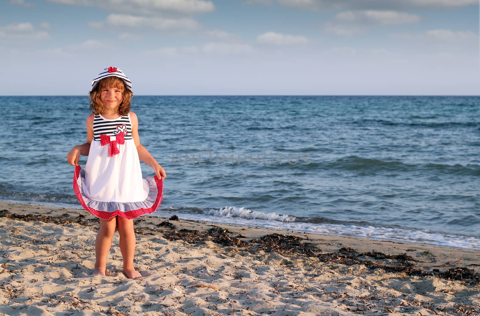 beautiful little girl on beach summer scene by goce