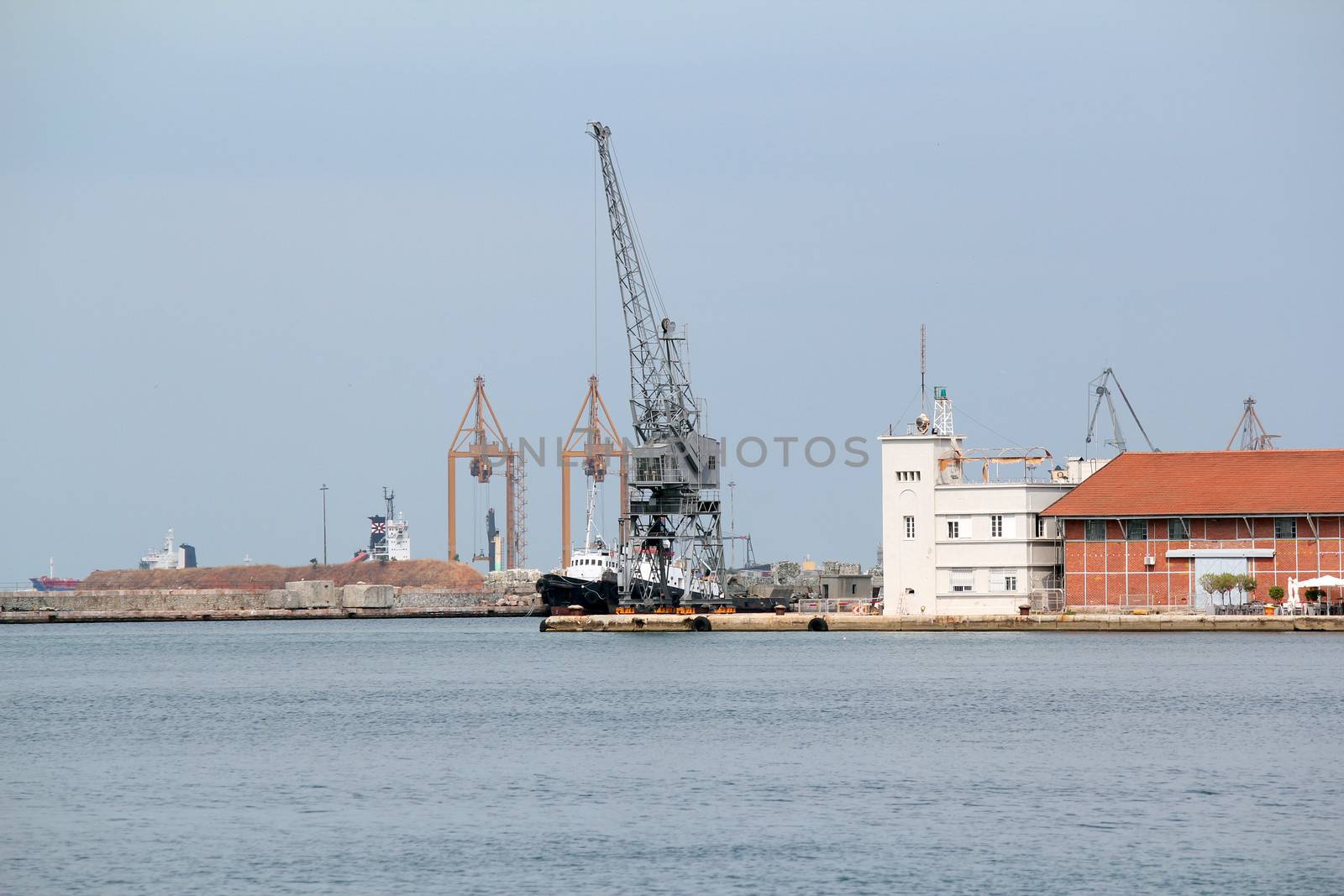 port with crane and ship Thessaloniki Greece by goce