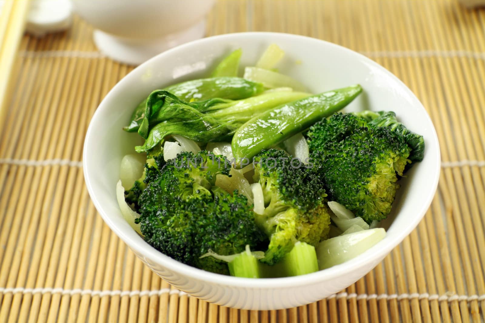 Delicious bowl of freshly cooked Chinese vegetables ready to serve.