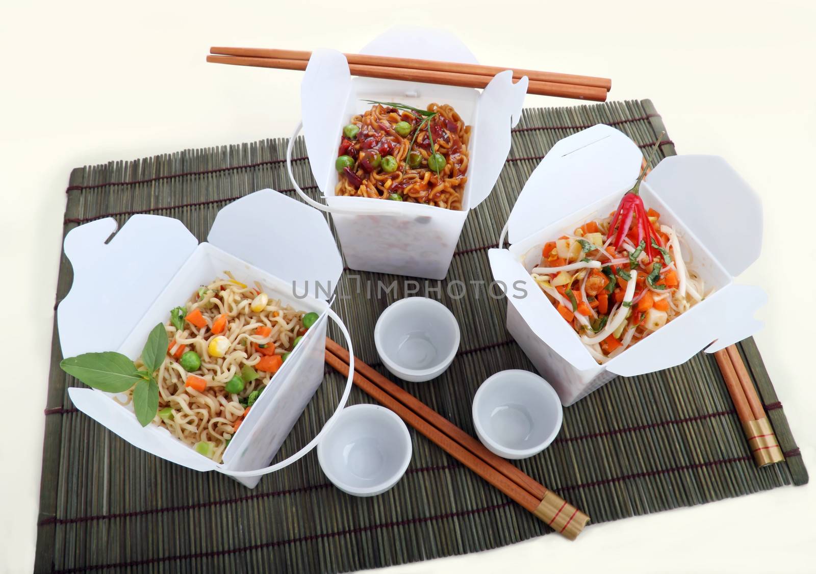 BBQ egg noodles, vegetables noodles and chili rice noodle vermiceli in take away containers.