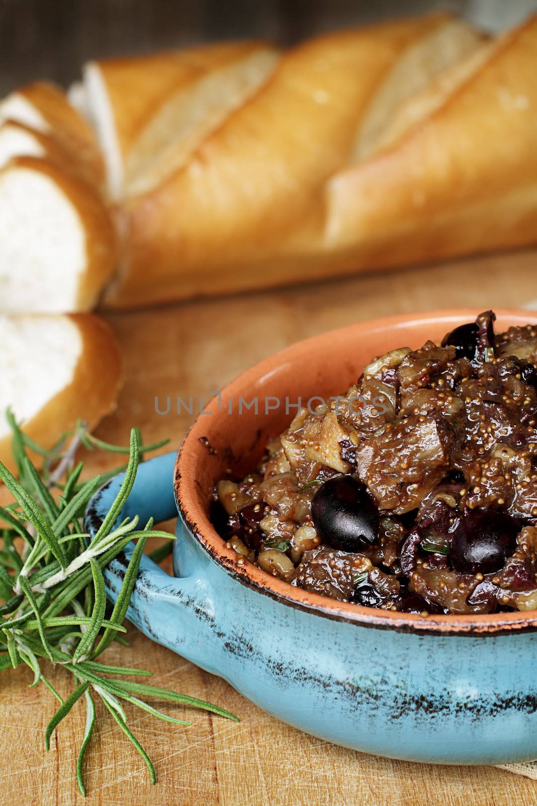 Fig Tapenade prepared with figs, kalamata olives and fresh herbs.