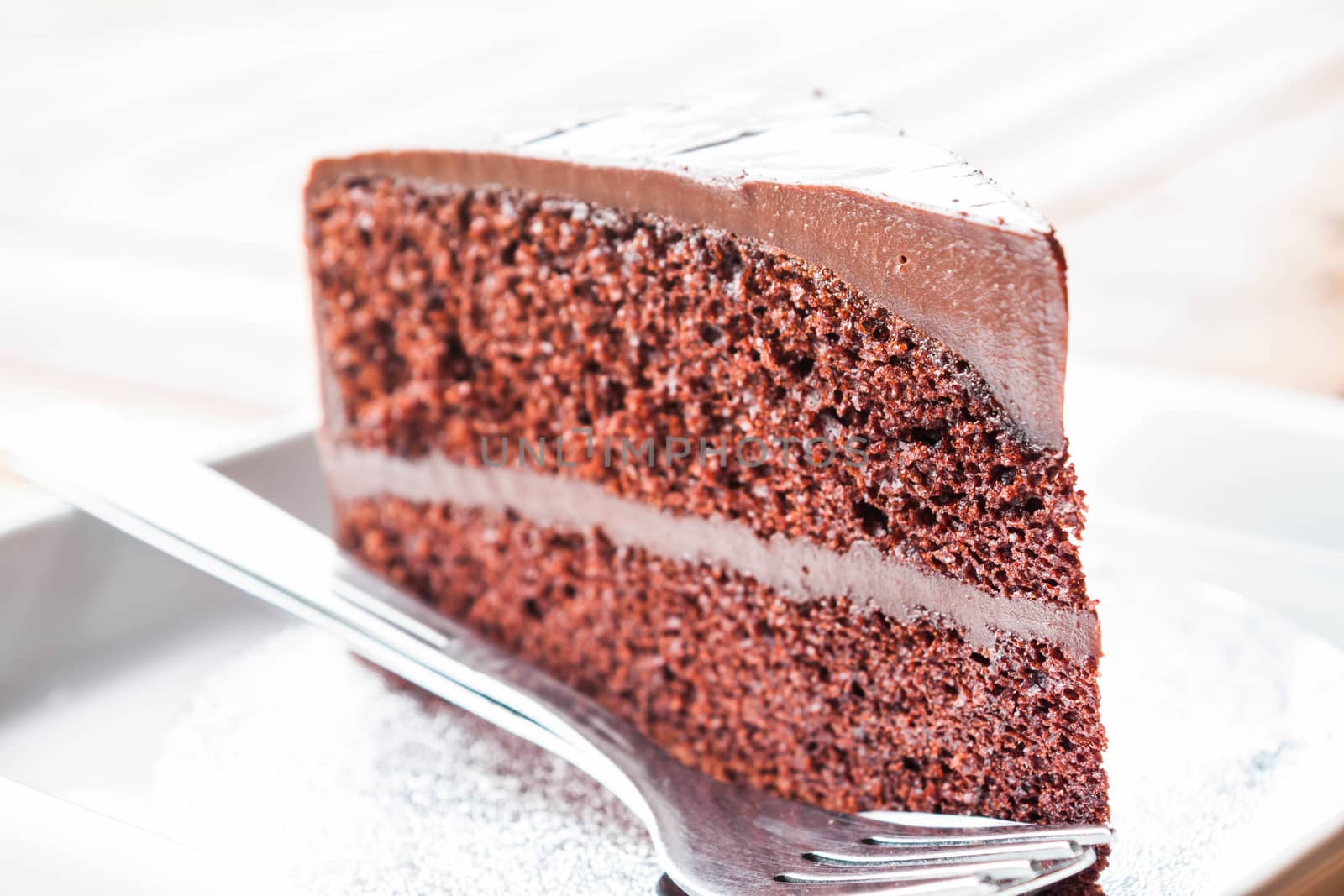 Chocolate custard cake serving on the table