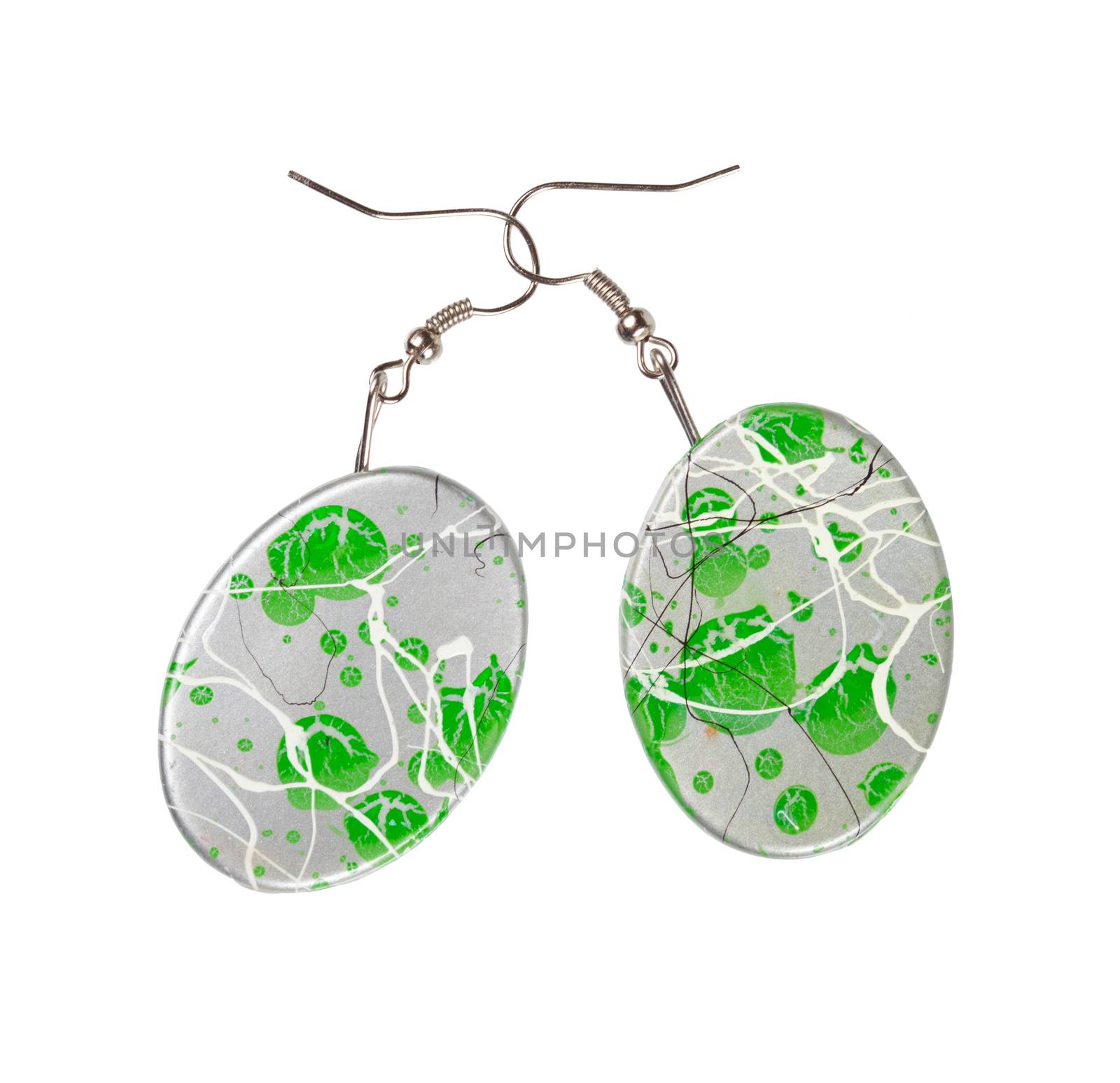 Plastic oval-shaped earrings with abstract pattern. Isolated on white background