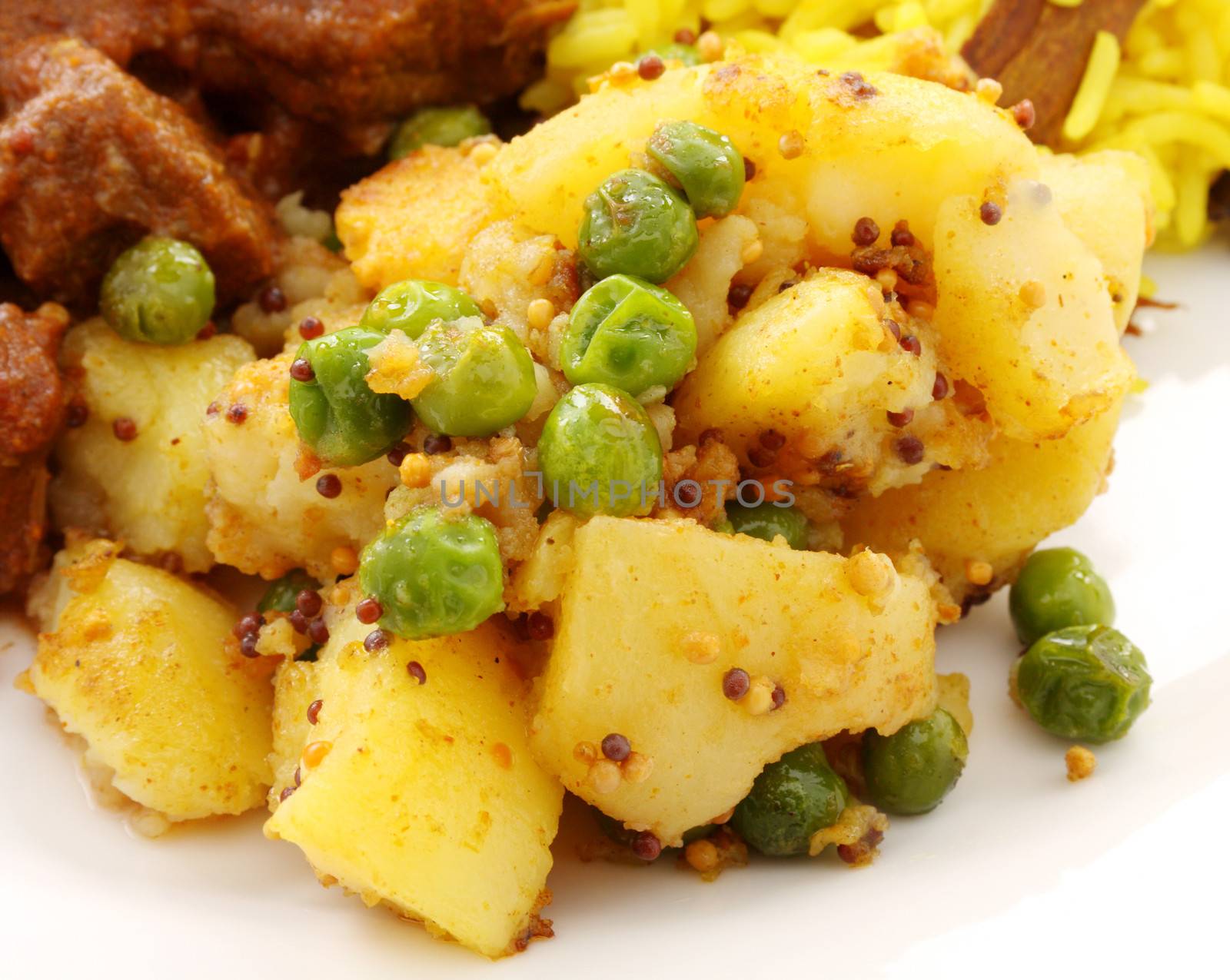 Spicy Tumeric Potatoes by jabiru