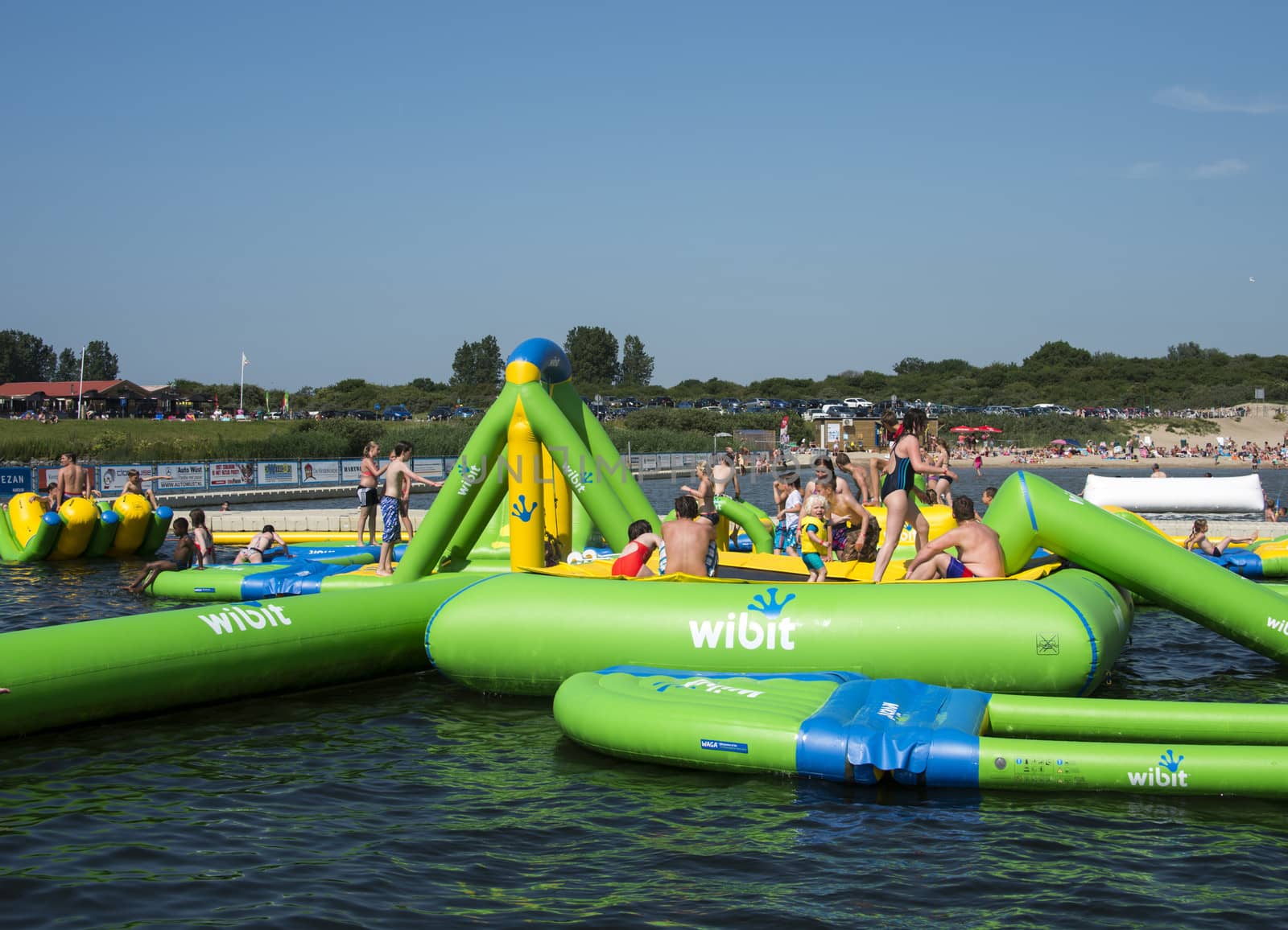 HELLEVOETSLUIS,HOLLAND - JULY 08:Unidentified children having pun in the aqua splash park ,on July 08,2013 in Hellevoetsluisk, Holland.This water park is the only open water park in Holland