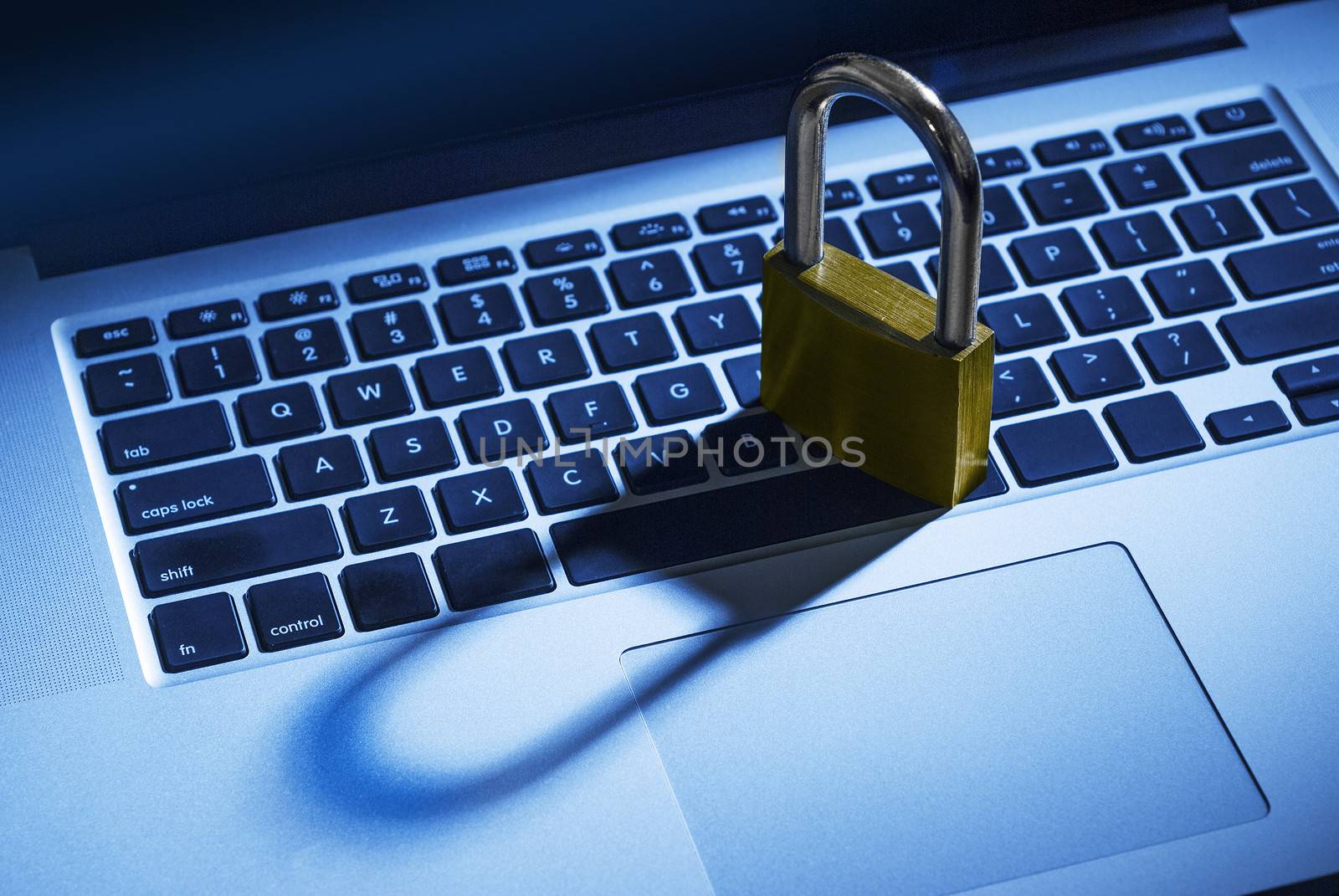 Padlock on computer keyboard. Concept of computer and internet security.