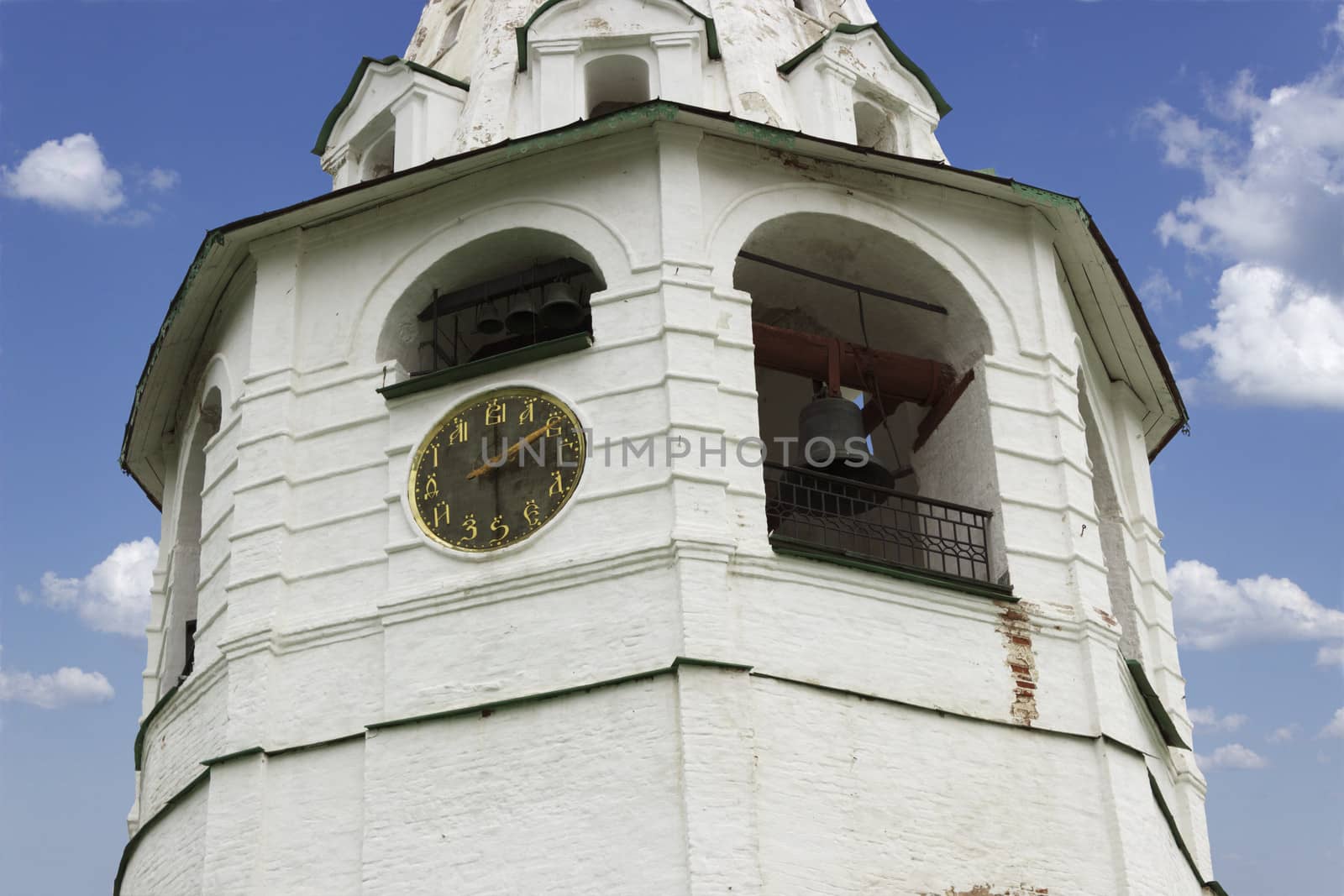 Cathedral bell tower with a clock in Suzdal Kremlin. Russia