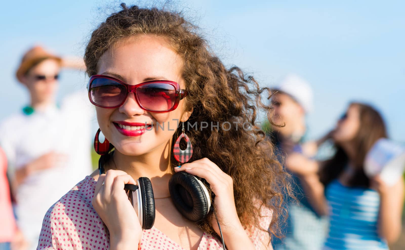 young woman with headphones by adam121