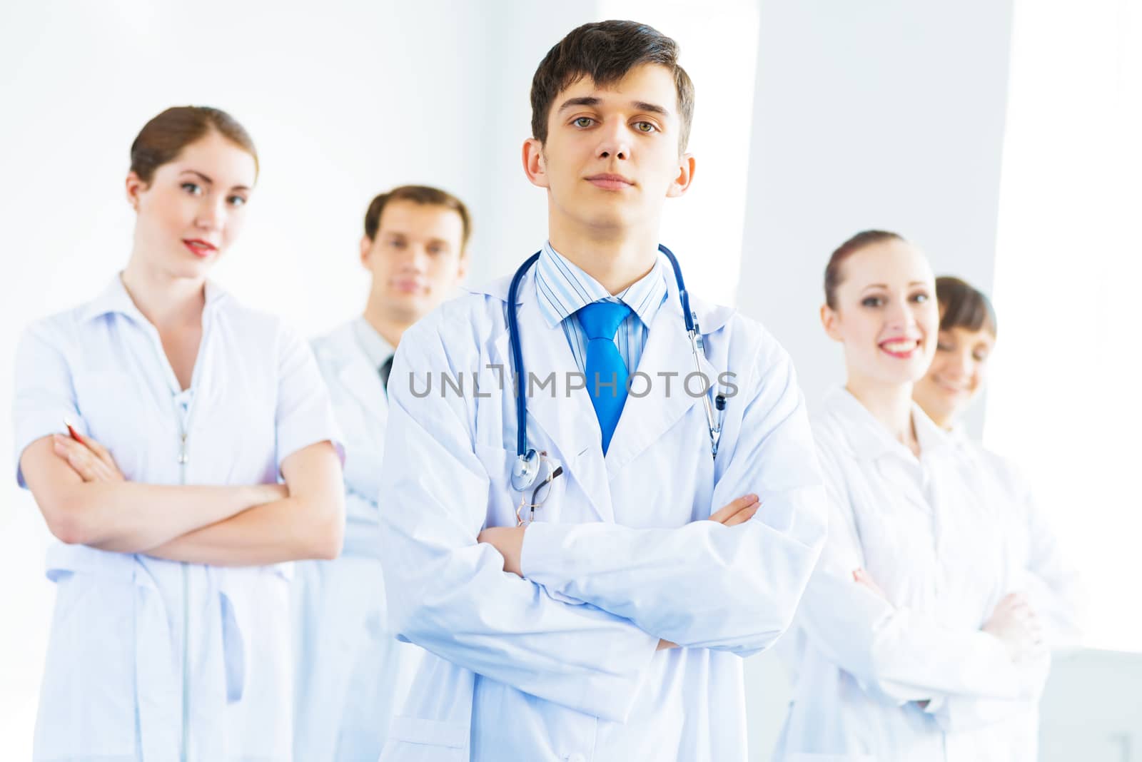 team of experienced highly qualified doctors, fold one's arms