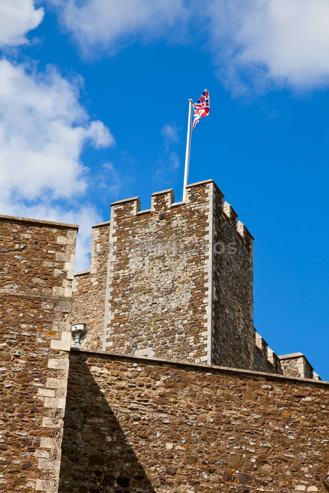 Dover Castle with waving Union Jack by naumoid