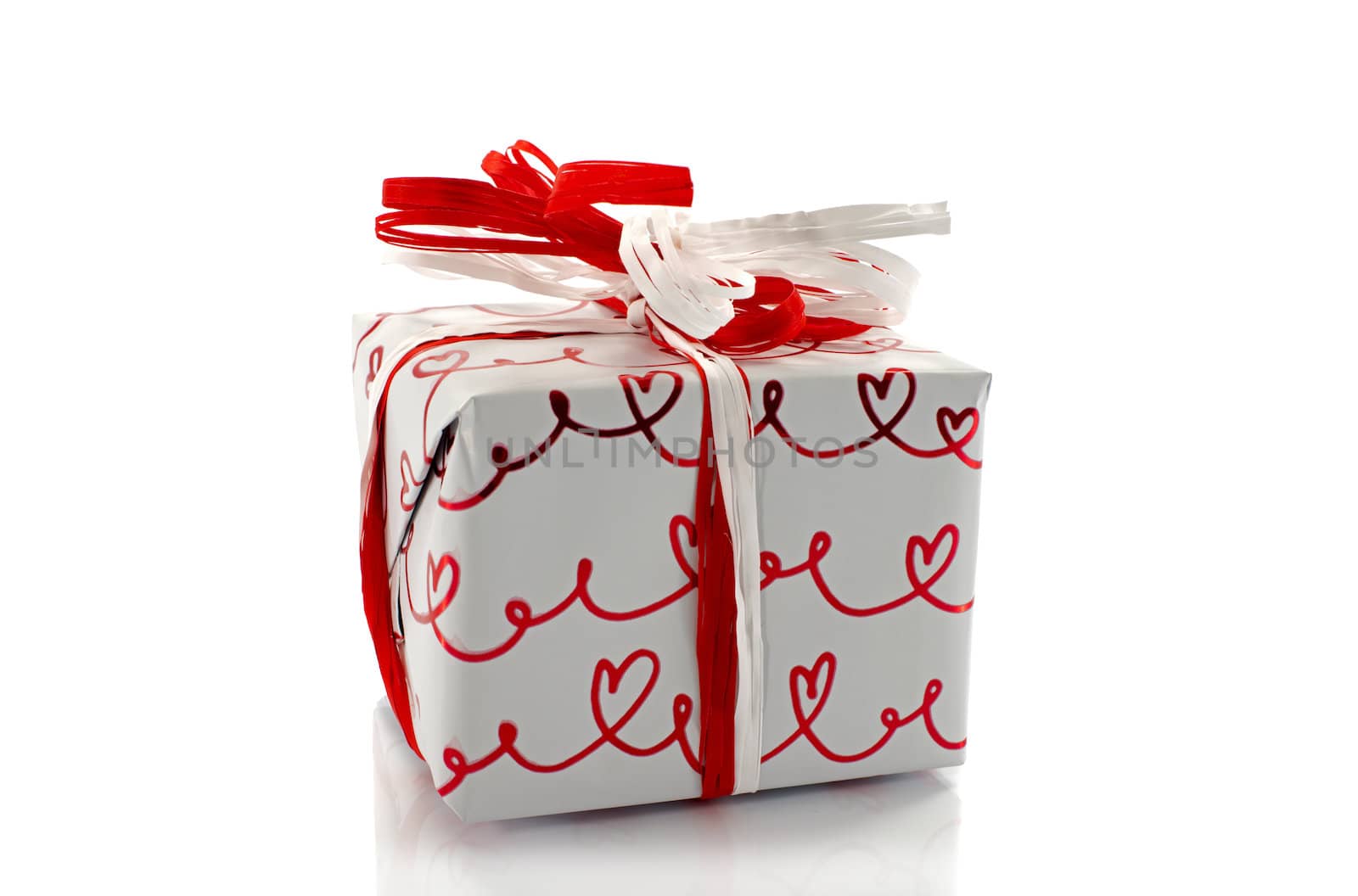 present box with red and white bow by compuinfoto