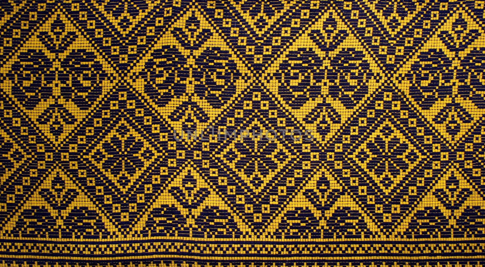 Detail of a traditional romanian carpet with geometrical motives 