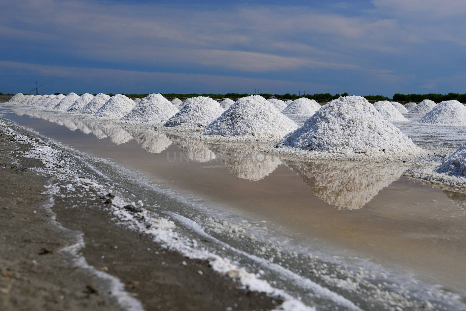 Salt Mine in Salt farm and reflections in thailand