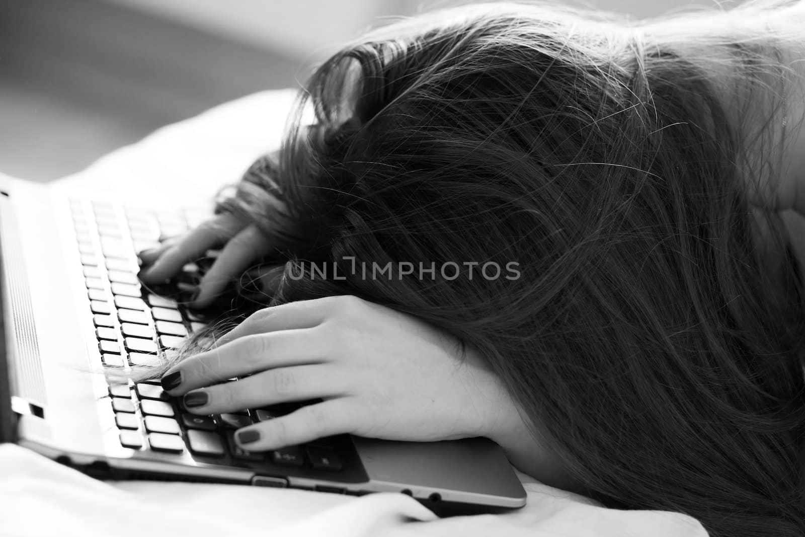 Woman near the notebooks keyboard