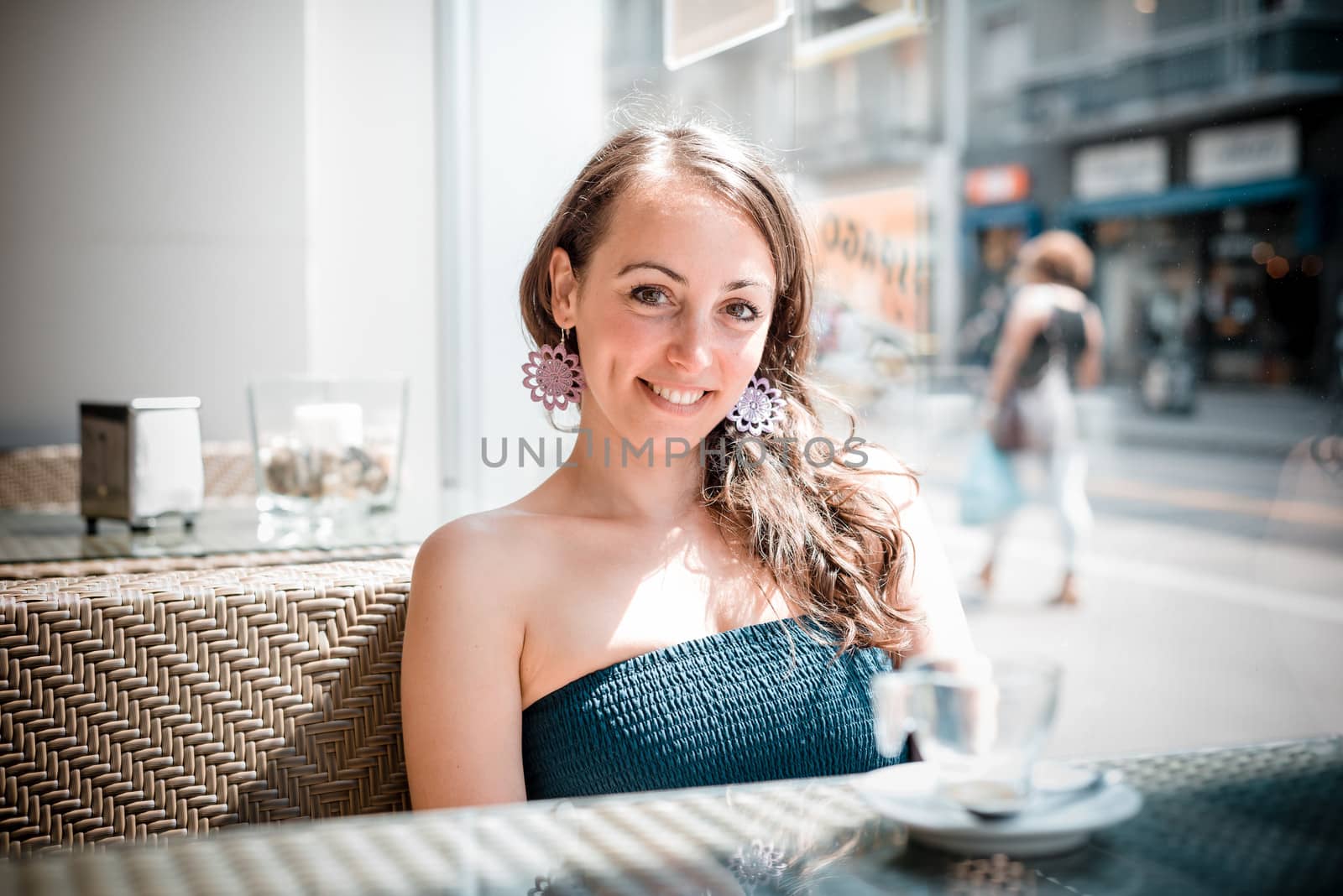 young beautiful woman at the coffee