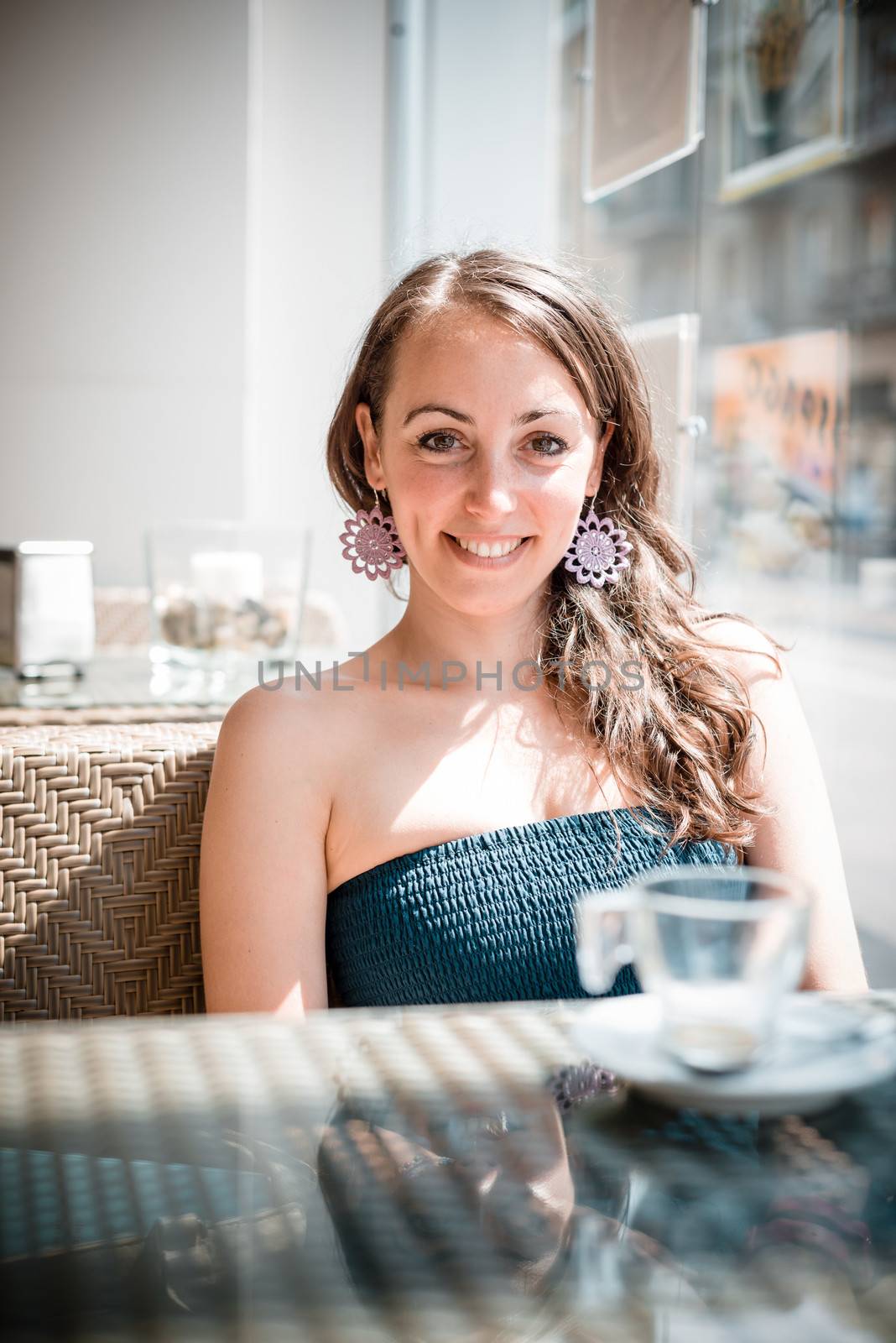 young beautiful woman at the coffee