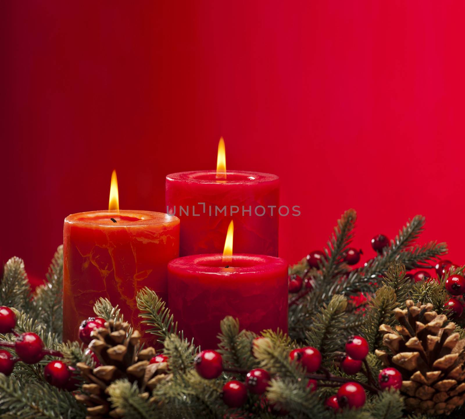 Red advent wreath with candles by 3523Studio