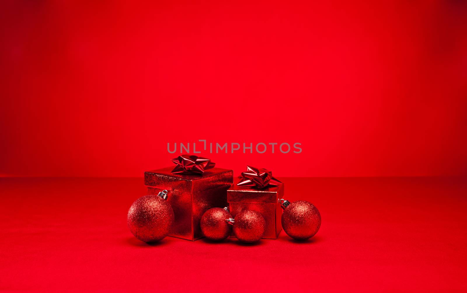 Red bauble and Christmas present by 3523Studio