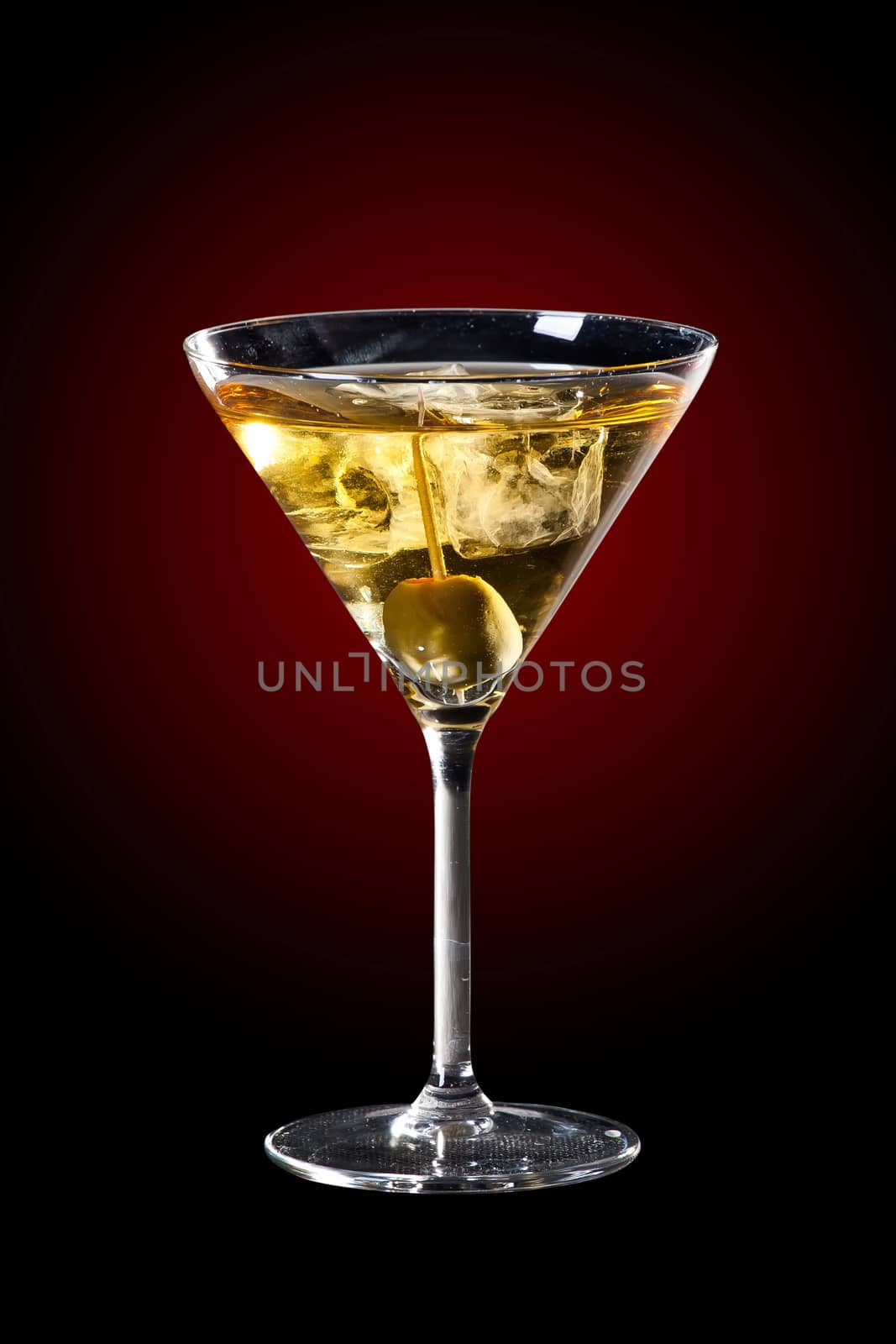 Delicious olive and martini cocktail