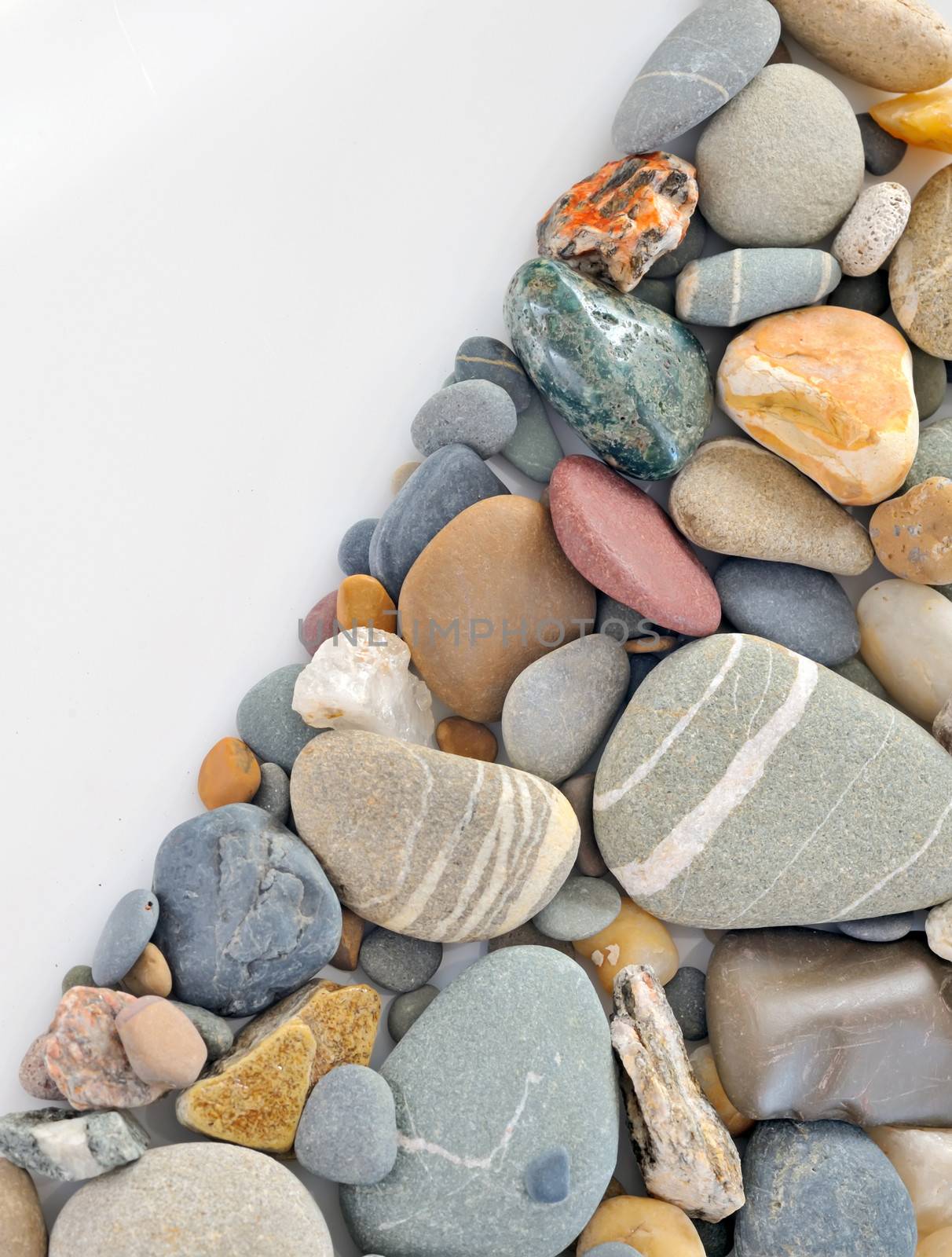colored stones on white background