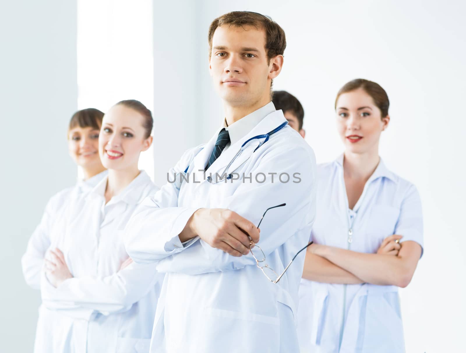 team of experienced highly qualified doctors, fold one's arms