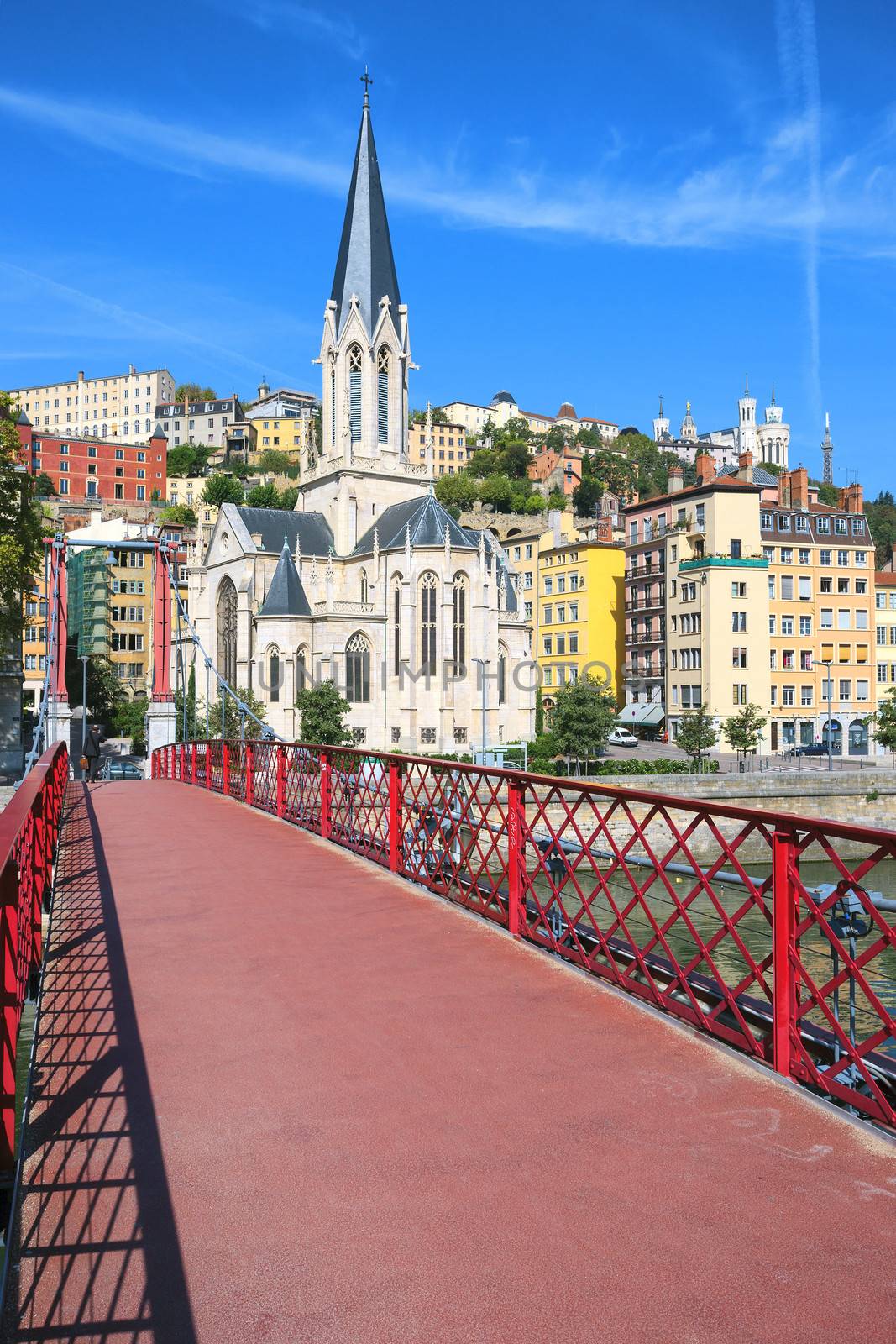 View of Lyon city with red footbridge on Saone river