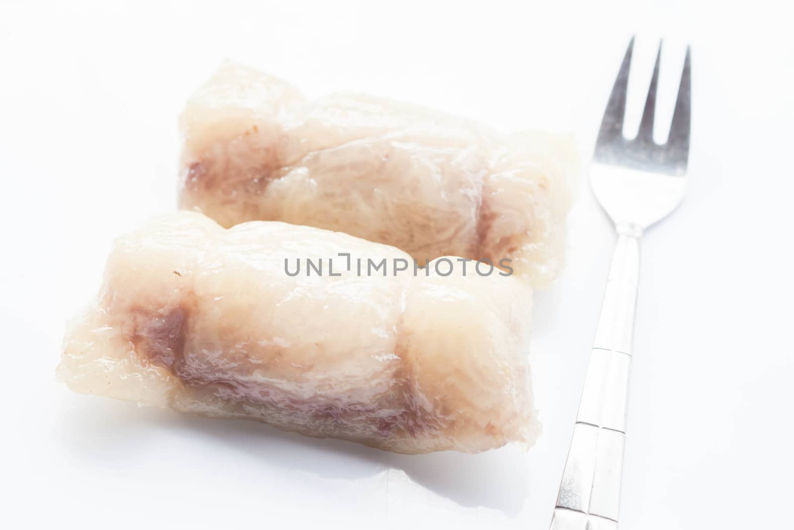 Bunch of mush banan filling with fork isolated on white background, stock photo