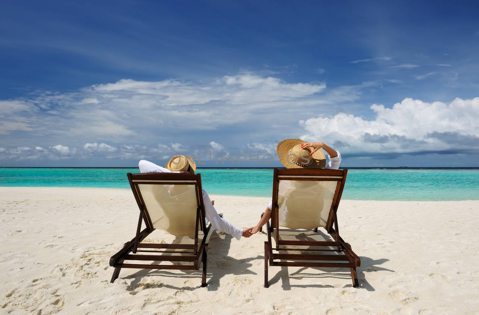 Couple on a tropical beach at Maldives