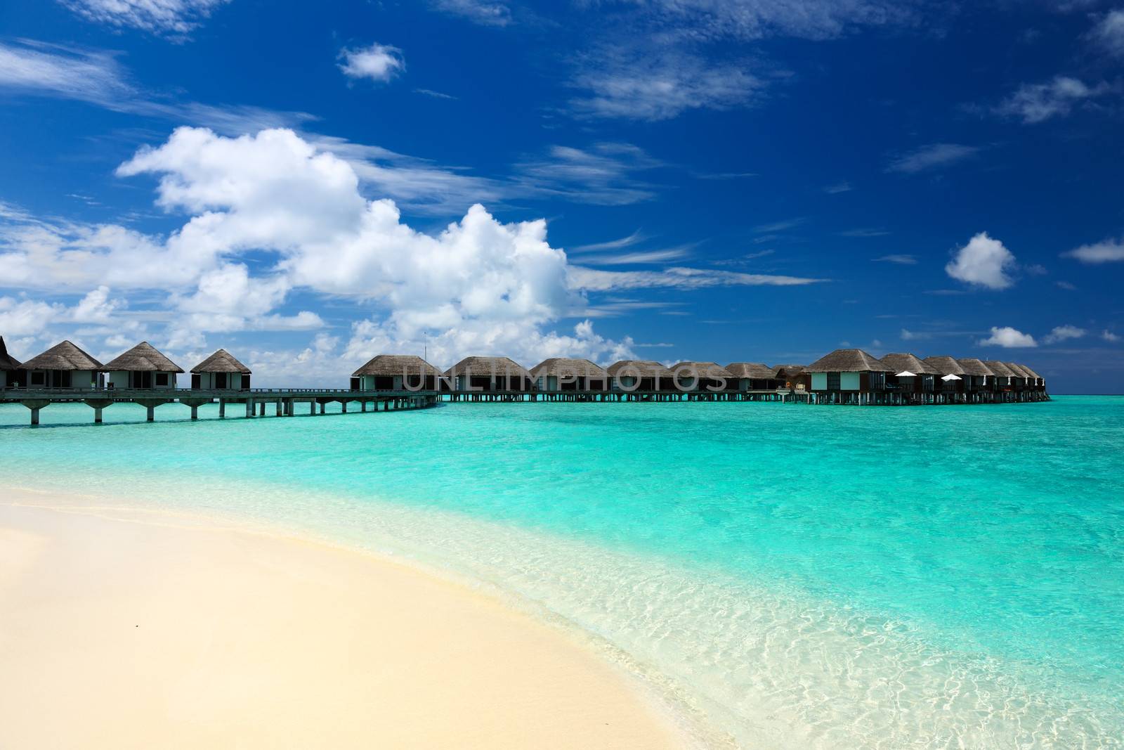 Beautiful beach with water bungalows at Maldives
