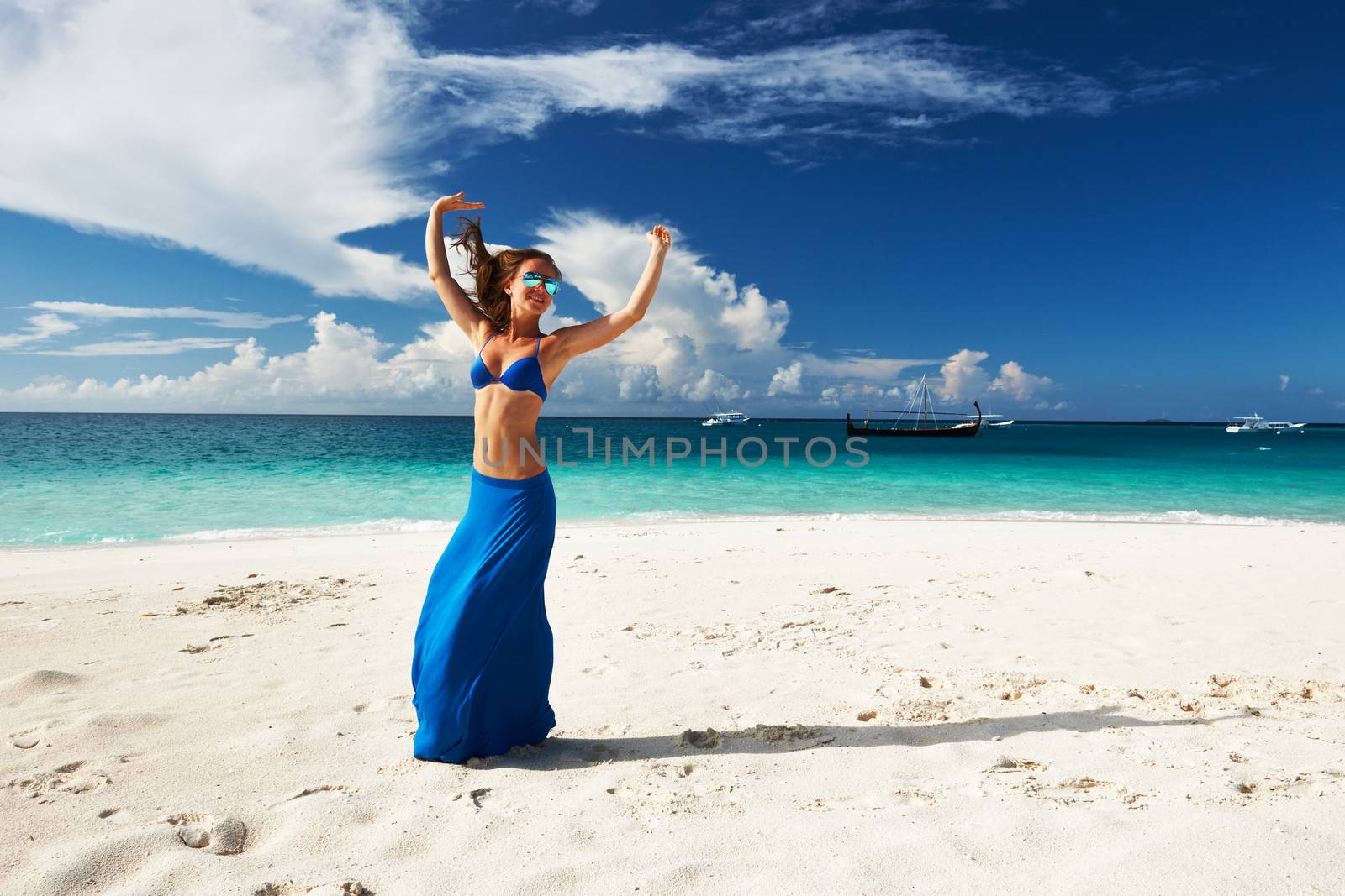 Woman at beach by haveseen