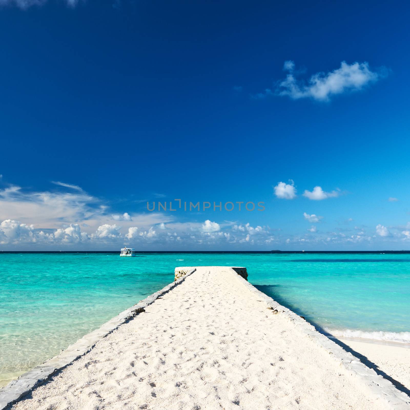 Beautiful beach with jetty at Maldives