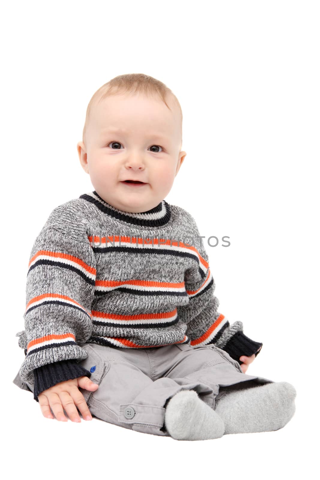 beautiful happy baby boy sitting on white background