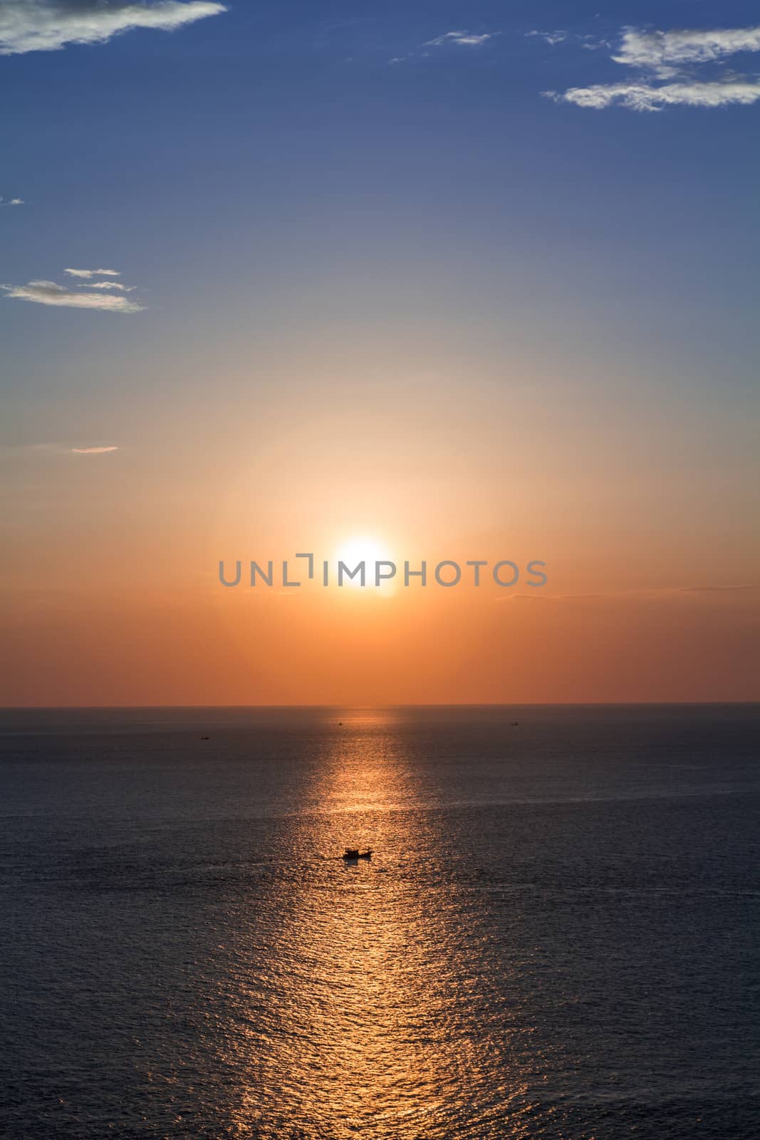 Fishing boats at sunset silhouette by lavoview