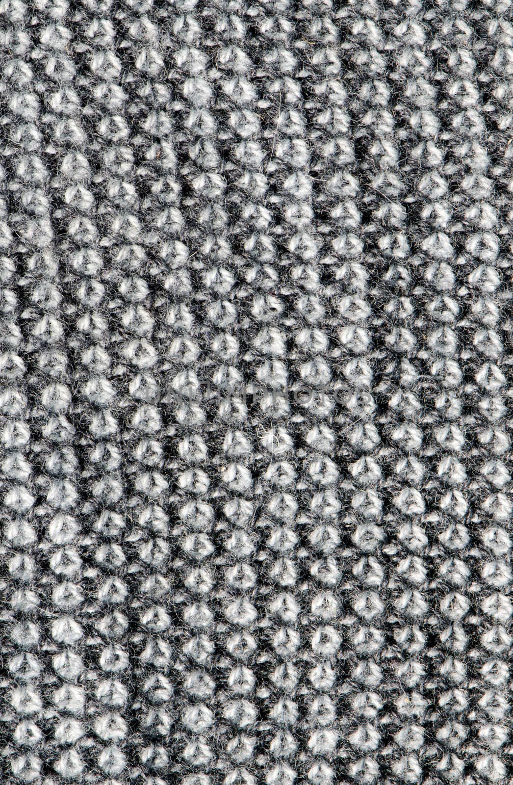 macro woollen machine knitted jacket background by sauletas